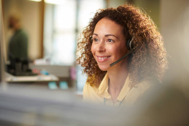 Instal-Life team member speaking with a customer by phone